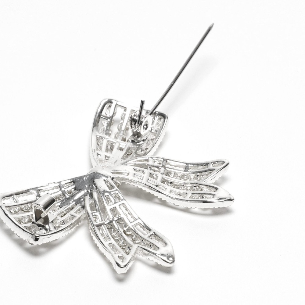 Брошка металева зі стразами Бантик 4.3см (31775) 3