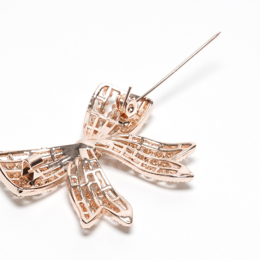 Брошка металева зі стразами Бантик 4.3см (31775) 7