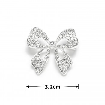 Брошка металева зі стразами Бантик 3.2см (31777)