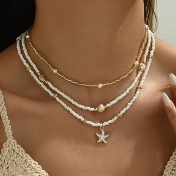 Набір підвісок на шию з перлинних намистин білого кольору 3шт (31816)